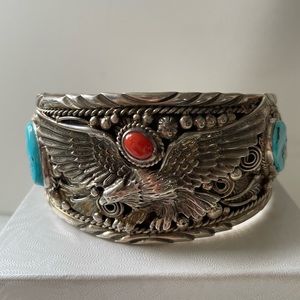 Big boy traditional turquoise, coral and sterling silver eagle cuff.